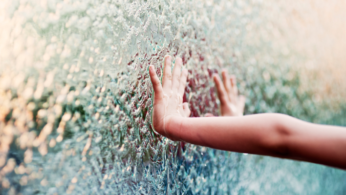 A Child Touching Water
